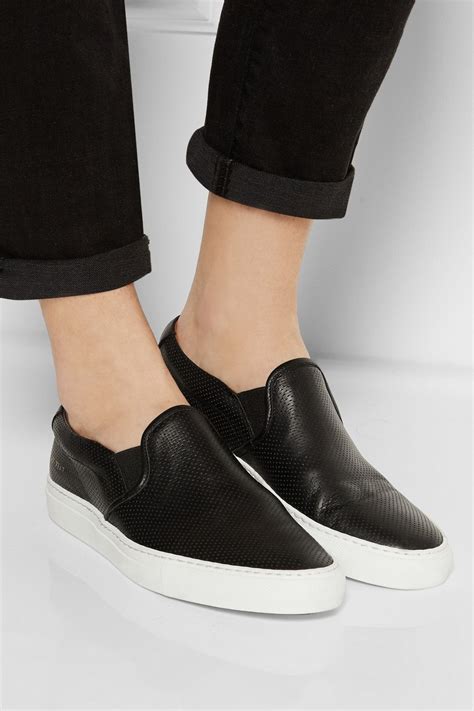 black slip on sneakers leather